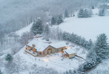 Aerial view of snowy lodge in Banner Elk, NC
